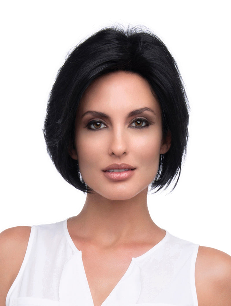 headshot of model wearing black chin length wig