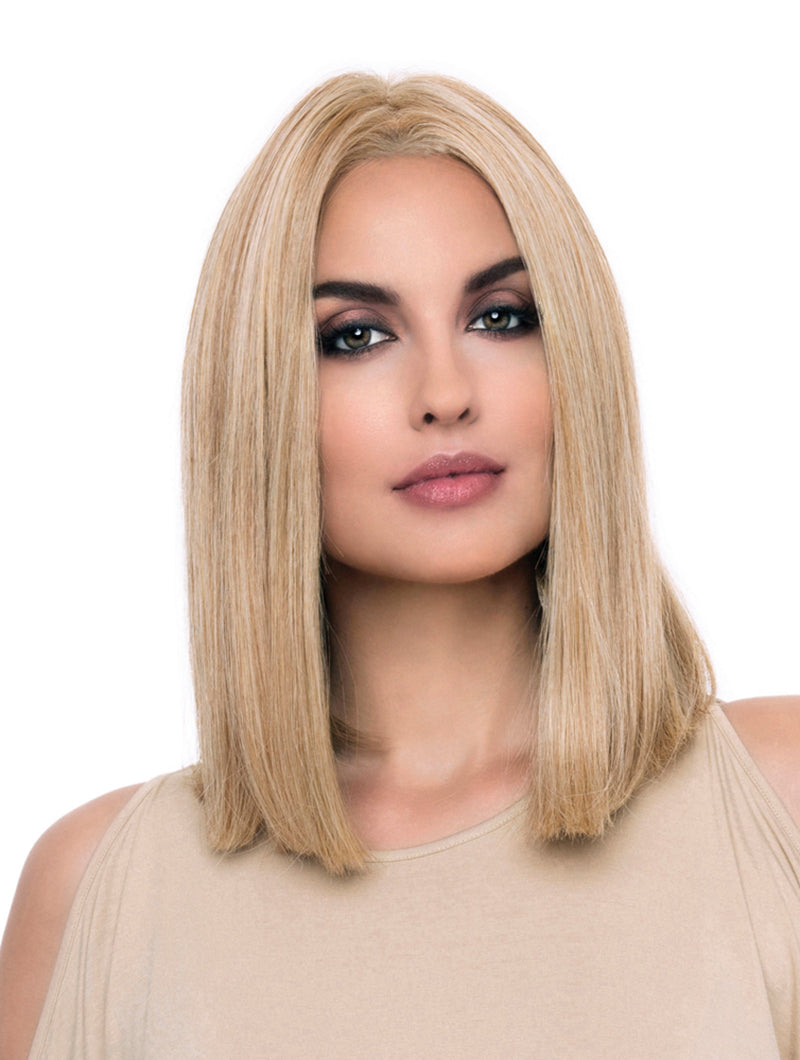 headshot of model wearing blonde shoulder length wig