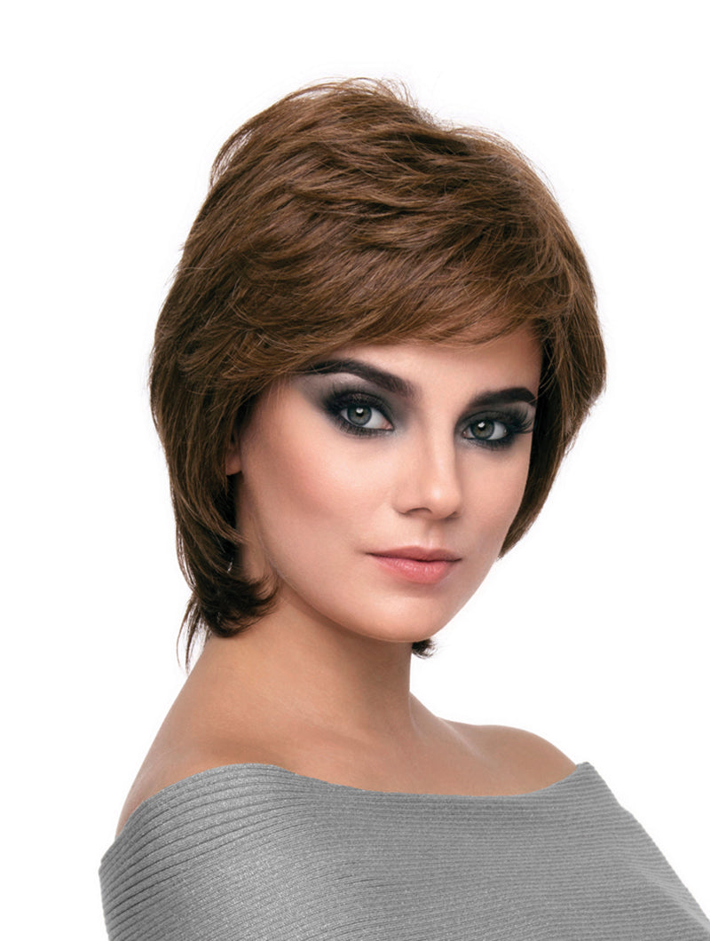 headshot of model wearing brown chin length wig