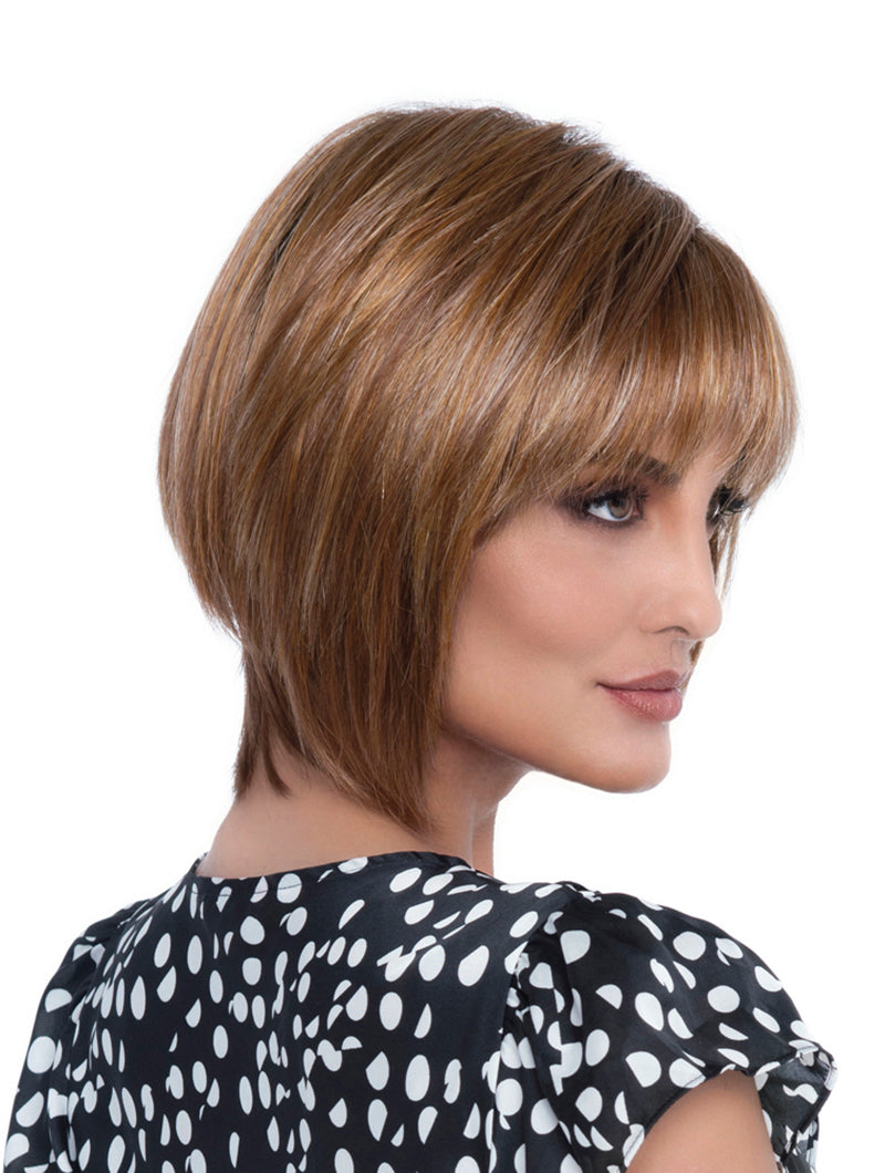 side profile of model wearing red chin length wig with bangs