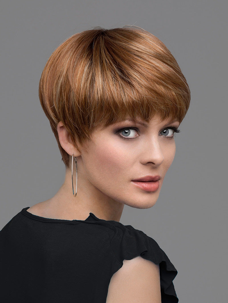 headshot of model wearing red bowl cut style wig