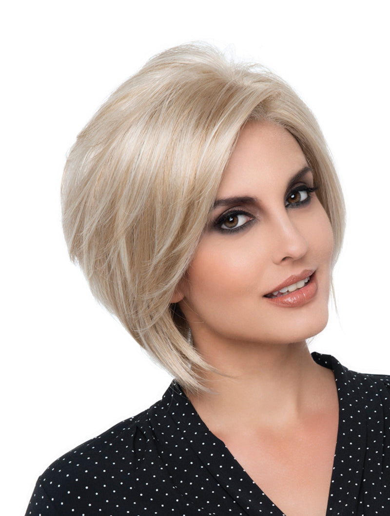 headshot of model wearing blonde bob style wig