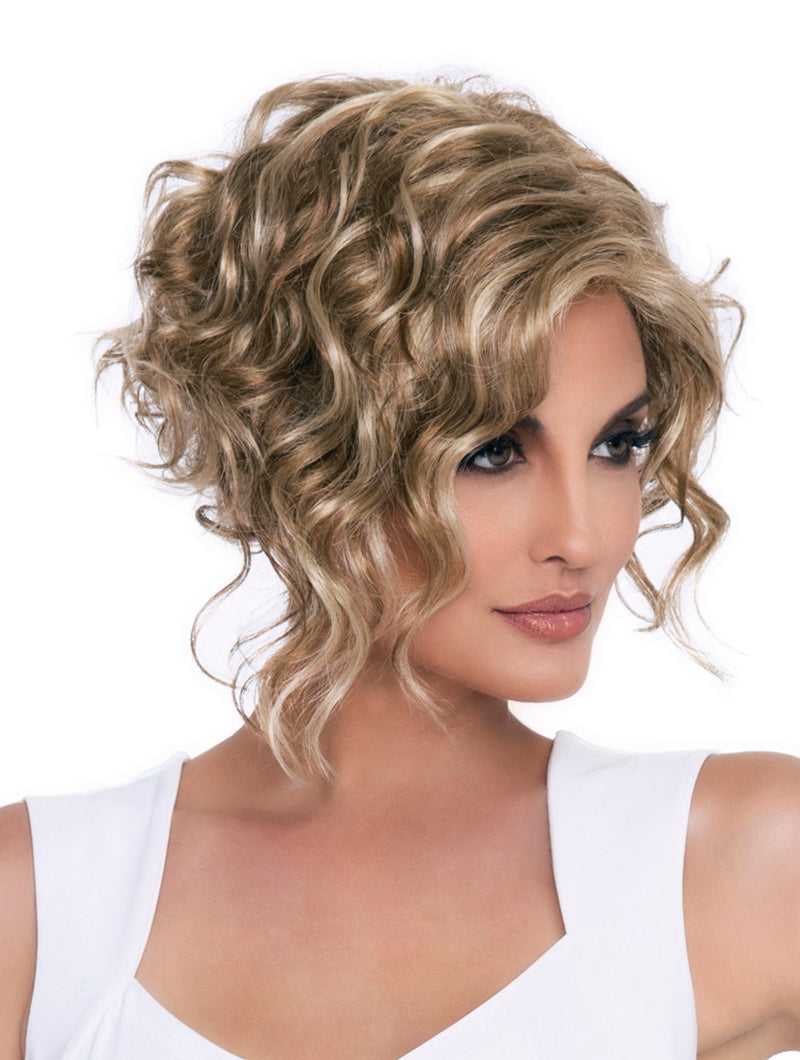 headshot of model wearing blonde curly wig