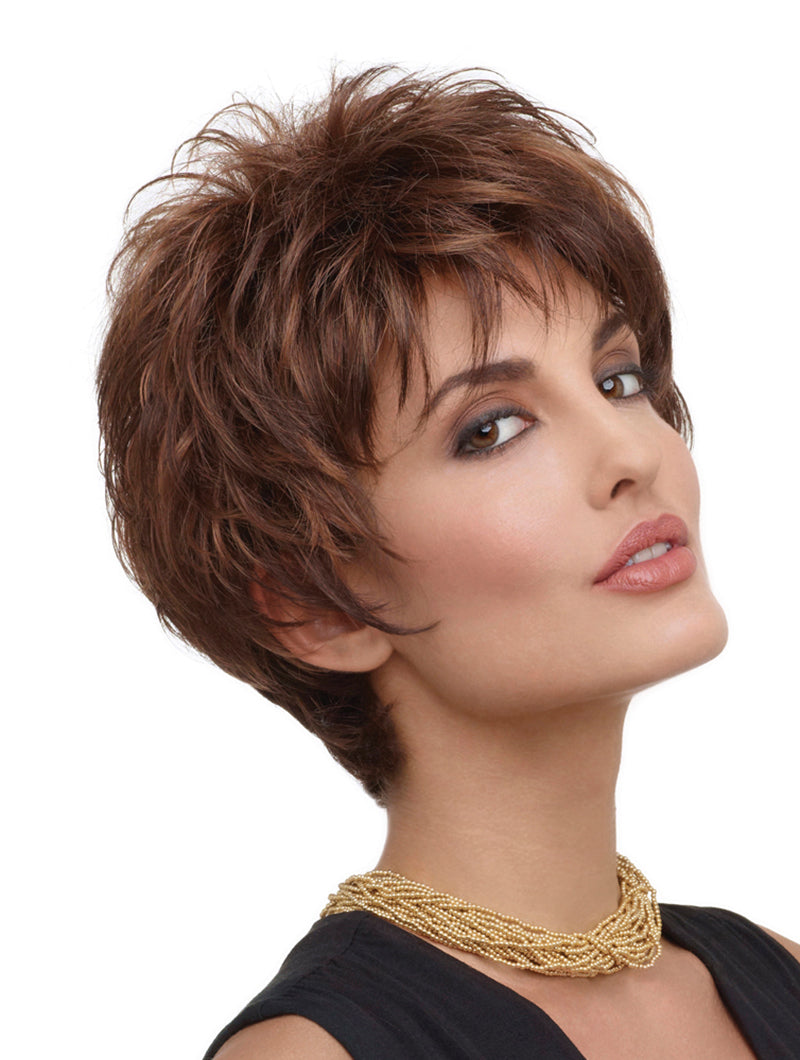 headshot of model wearing brown spiky wig