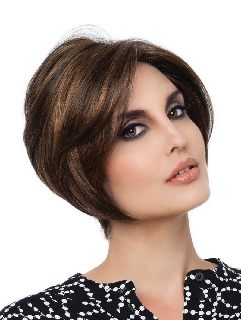 Headshot of model wearing brown chin length wig