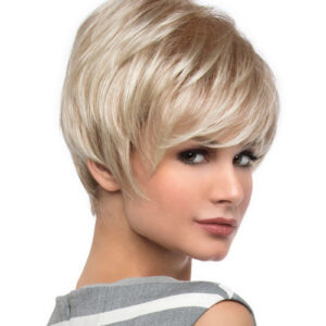 headshot of model wearing blonde pixie cut wig