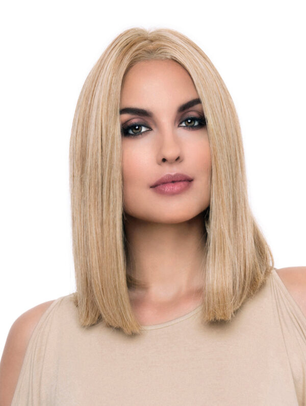 headshot of model wearing blonde shoulder length wig