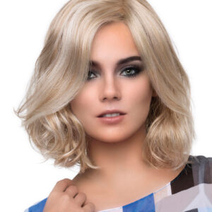 headshot of model wearing blonde chin length wig