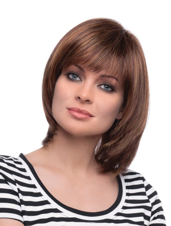 headshot of model wearing brown layered chin length wig