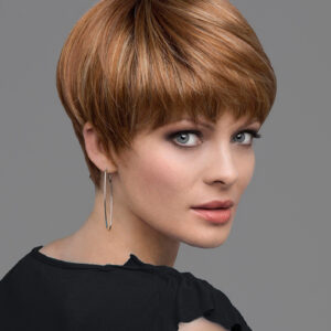 headshot of model wearing red bowl cut style wig