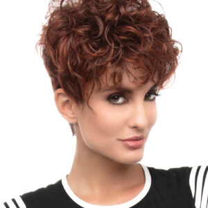 headshot of model wearing red curly pixie cut wig