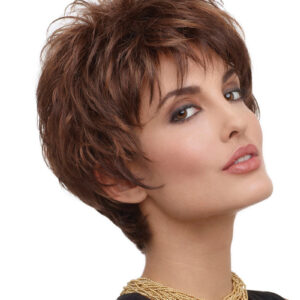 headshot of model wearing brown spiky wig