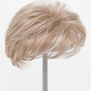 blonde layered topper on wig stand