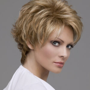 side profile of model wearing blonde pixie style wig