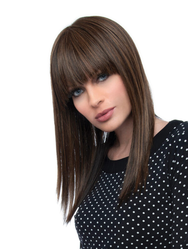 headshot of model wearing long brown wig with bangs