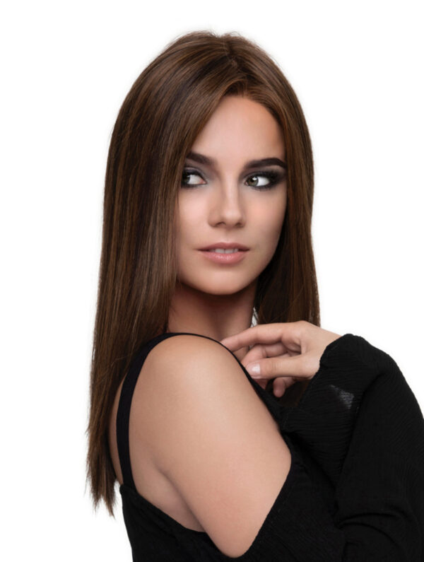 model in long brown wig looking over shoulder