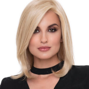 Headshot of model wearing blonde shoulder length wig